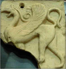 Griffin relief from Praisos.jpg