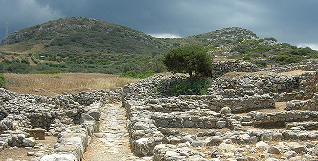 Small twin peaks seen looking south from a street in Minoan Gournia