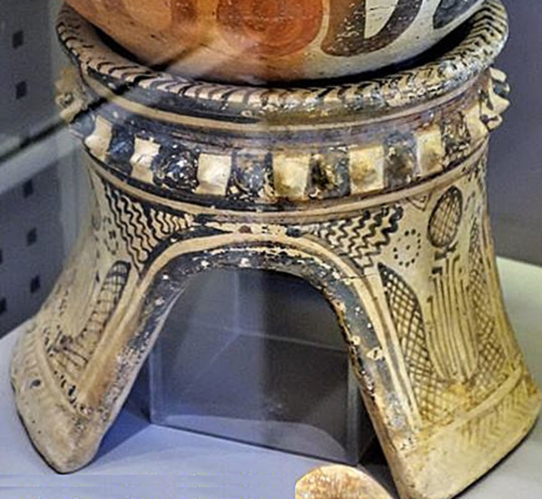 Late Minoan offering stand, ancestral horns bearing webs of 'x,' central Labrys with vegetation, and astronomical symbols---Heraklion Museum